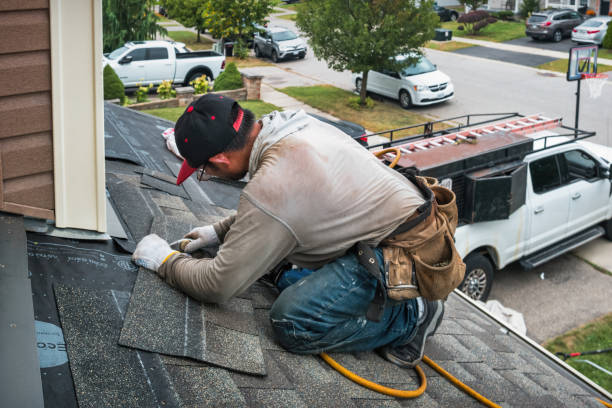 Professional Roof Replacement technician working in Arcadia, IN